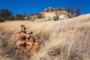 Rock Cairn Below Hill