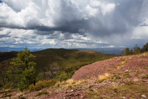 Storm Clouds Passing Over Rocky Hills