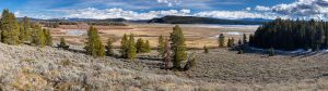 A depleted Jackson Lake disappearing into the distance below hills along the Hermitage Point Trail. Grand Teton National Park, Wyoming