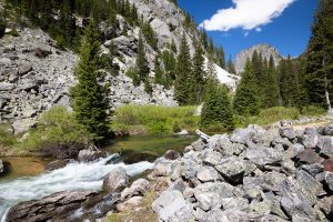 Small Waterfall Through Rocky Canyon