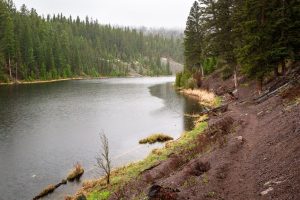Light rain showers falling over Lost Lake. Yellowstone National Park, Wyoming