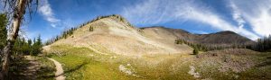 The Avalanche Peak Trail winding below the lower elevations of Avalanche Peak in the Absaroka Mountains. Yellowstone National Park, Wyoming